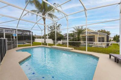 Screened in private pool at a Central Florida vacation rental near Disney.