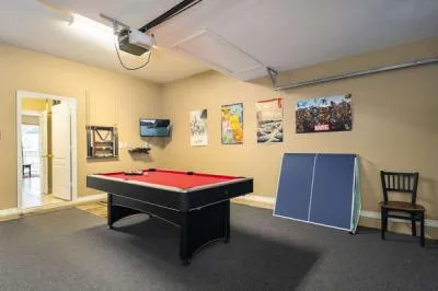 Game room showing pool table and ping pong