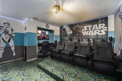 Upstairs star wars themed movie theater with games console