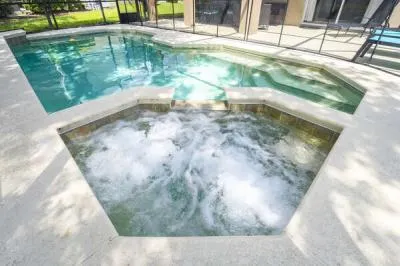 Pool area showing spa and jacuzzi jets working.
