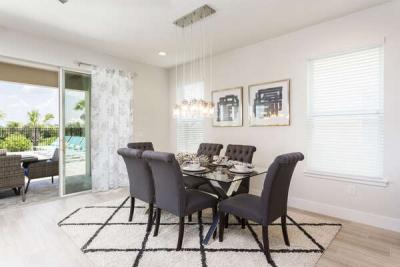 Formal dining for 6 with a beautiful bottle lighting above
