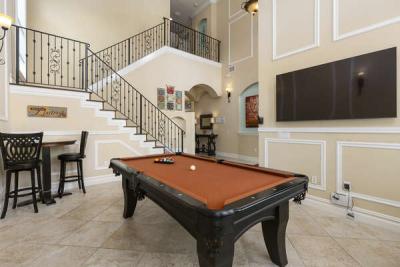 Shoot pool or watch the big game in your own billiard room