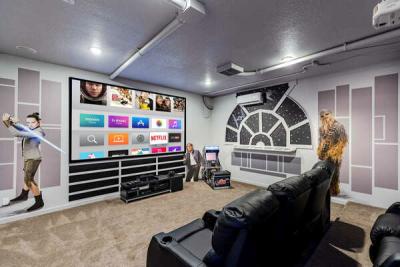 Head into the galactic theater and games room with theater seating for 7