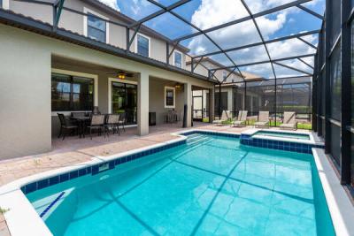 Enjoy a drink poolside at the dining table for 6