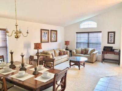 Formal seating and dining area with workstation