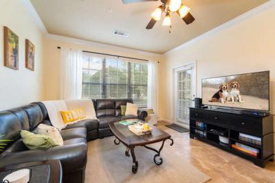 Lounge showing flatscreen TV and patio door