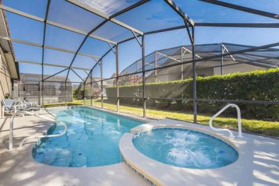 Pool and in ground spa showing the assistance bars to ease getting in out.