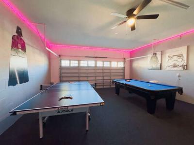 Games room showing pool table and ping pong table