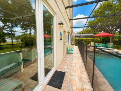 Pool deck showing pool safety fence.