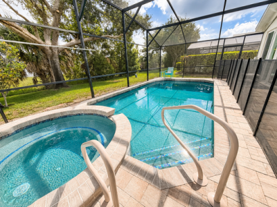 Screened in private pool deck.