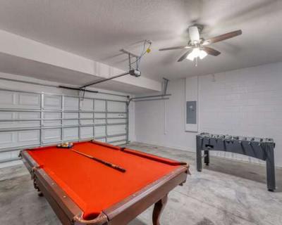 Garage showing pool table and foosball table