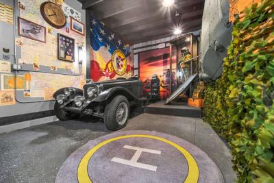 1930s SS Jaguar with a racing simulator and 2 PlayStation 5