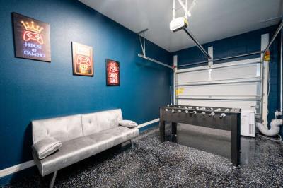 Games room  showing sofa and foosball table