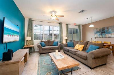 LIving room showing sofa and open floor plan.