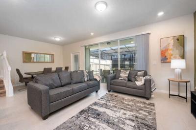 Lounge area showing patio doors to pool