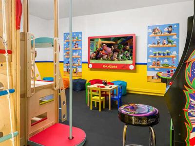 On the right is one of the gems of this home - the toy-themed indoor playroom.