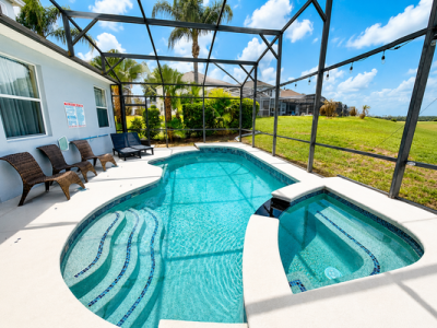 Pool area showing sun loungers and chairs.