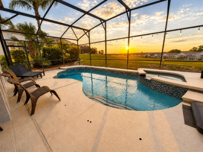Pool area with sunset view.