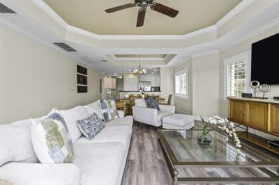 Gather in the spacious living room, designed with comfort in mind and ideal for entertaining guests or enjoying family time