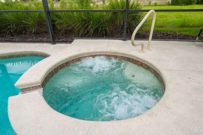 In ground spa with bubbling jets. Spa can be heated with additional charge throughout the year.