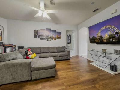 Living room showing seating and TV